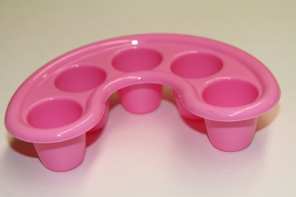 pink acetone resistant tray with 5 holes for fingers