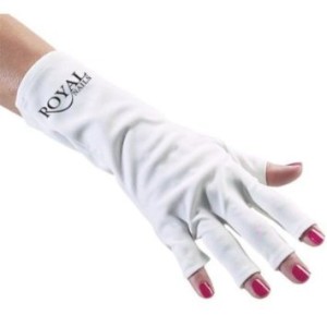 woman wearing a white royal nails anti-uv glove
